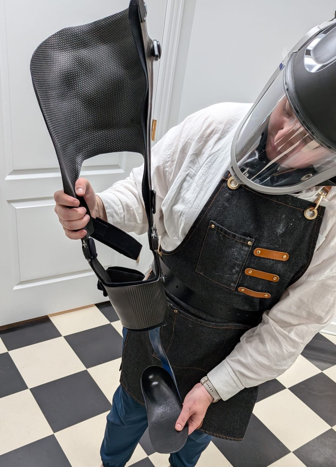 Custom carbon fibre knee ankle foot orthosis (KAFO) being made by WingTek near Regina, Saskatchewan
