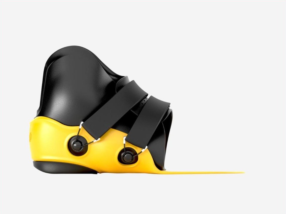 Supramalleolar orthosis (SMO) with a firm outer shell and a soft inner boot