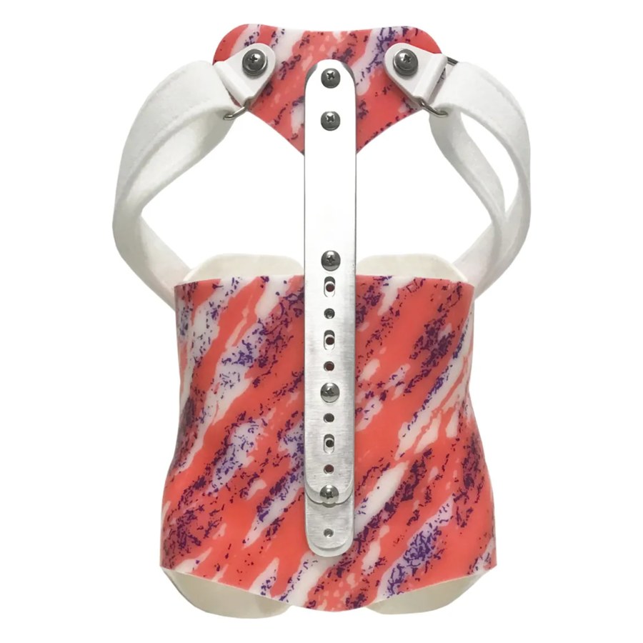 Coral and purple patterned custom kyphosis brace with shoulder straps and a metal bar up the front