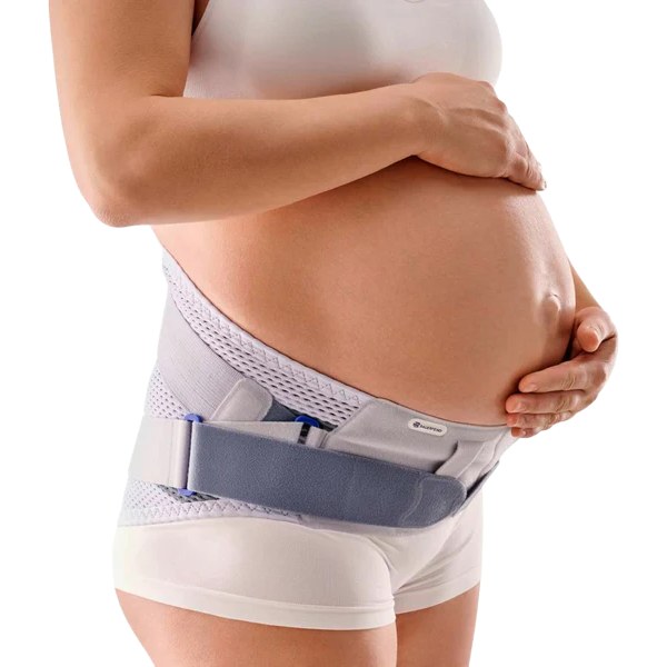 Pregnant woman wearing a soft support belt under the belly for low back and pelvic pain