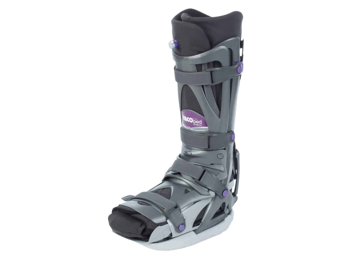VACOped diabetic offloading boot with vacuum cushion and rocker sole